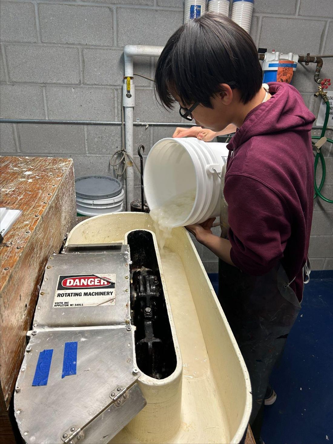Pouring pulp during handmade papermaking